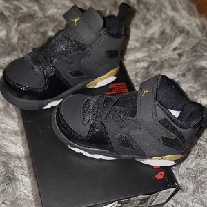 Nike Jordan Kids Black and Gold Sneakers
